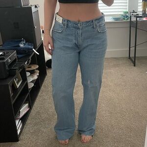 Abercrombie low rise baggy jeans size 28 dark wash with raw hem